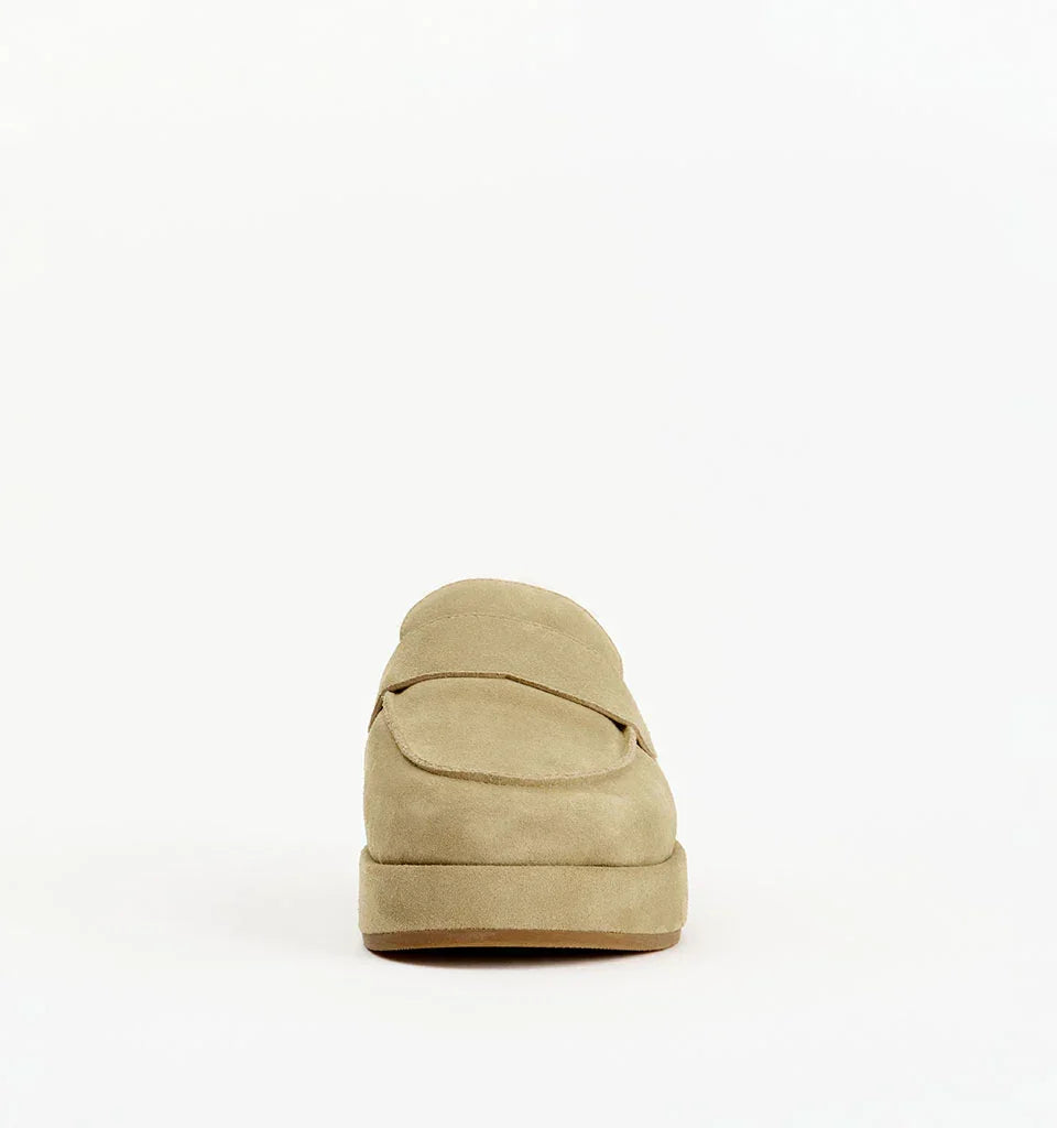 Front view of beige suede women's loafer on white background, platform sole