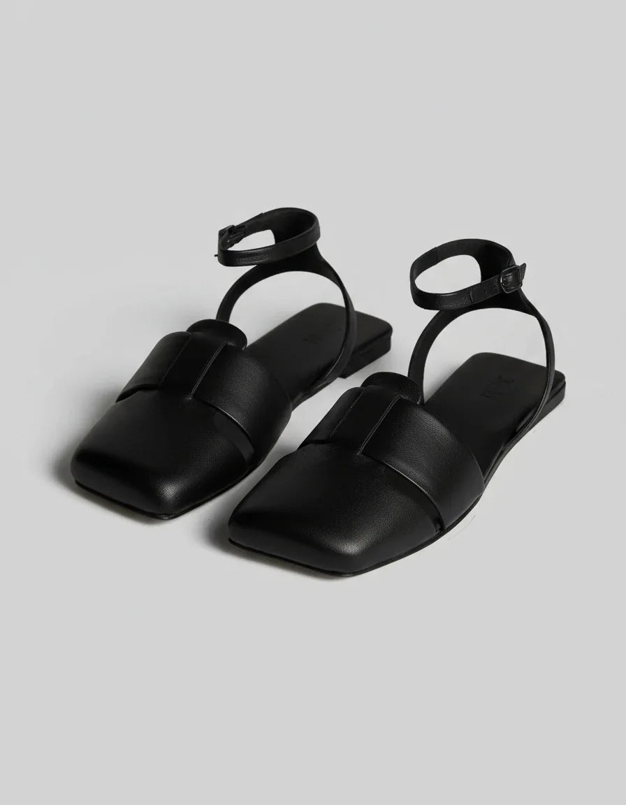 Black square-toe flat sandals with ankle strap for stylish everyday wear