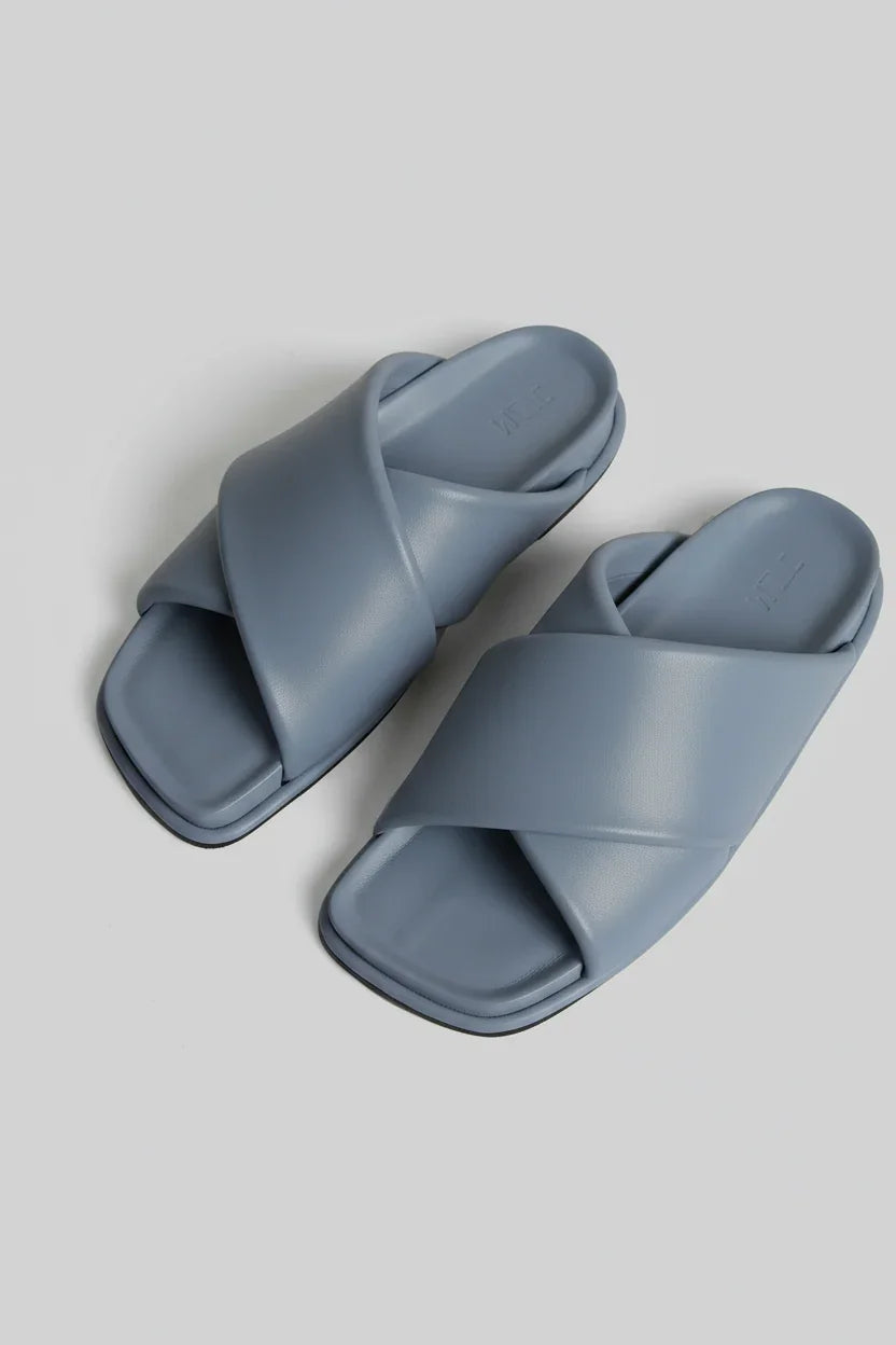 Dusty blue crossover slide sandals with minimalist design for women's casual wear