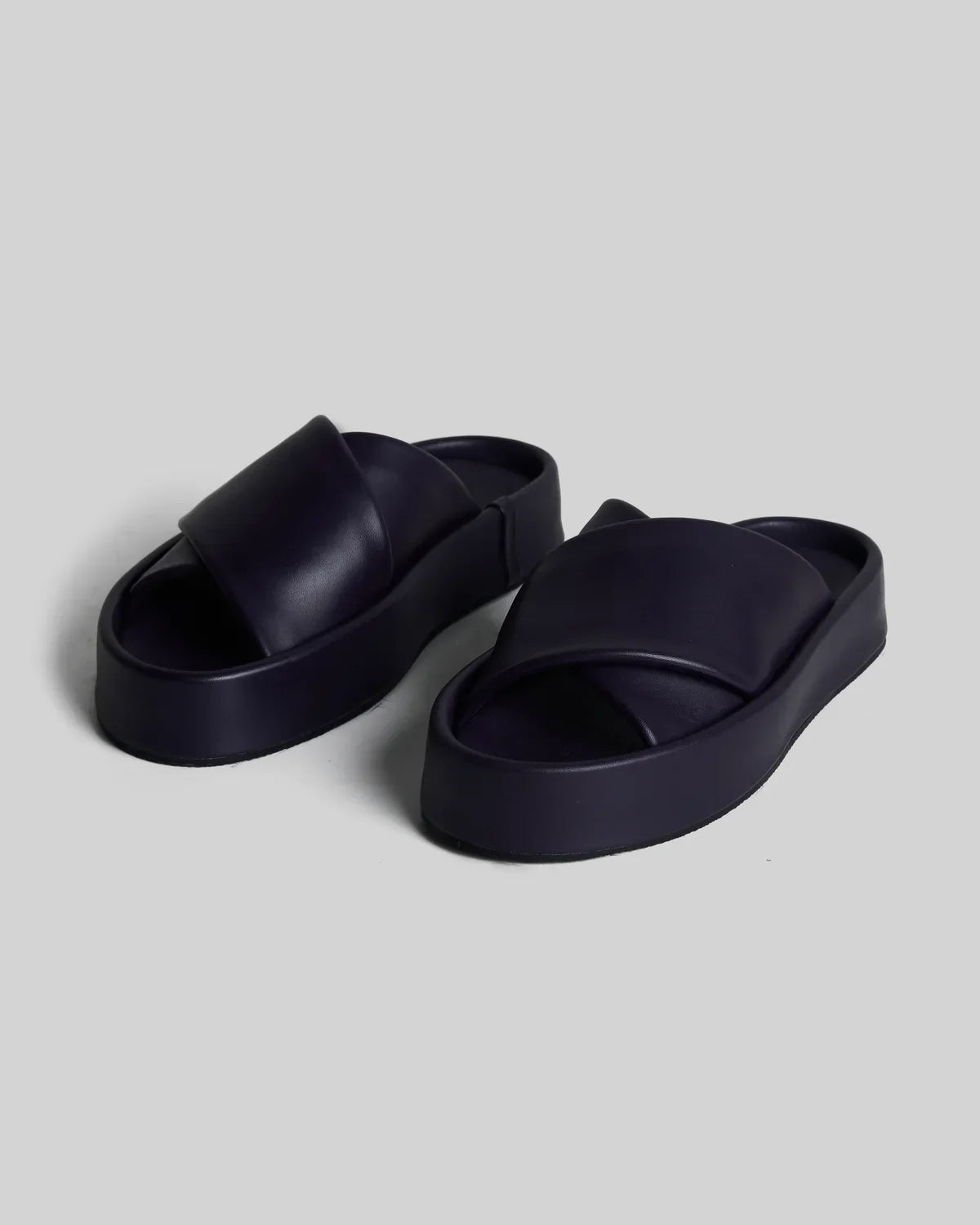 Navy blue platform slide sandals with wide strap, stylish women's footwear for everyday wear
