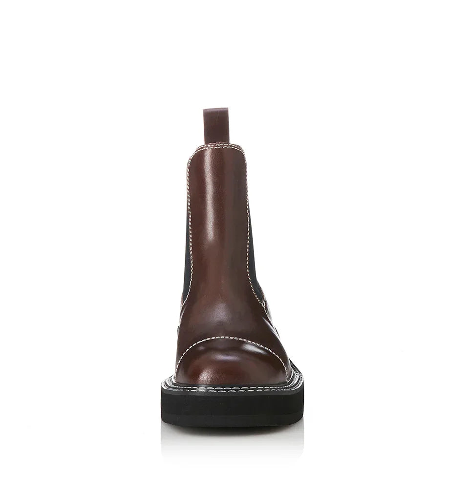 Brown leather Chelsea boot with white stitching and chunky black sole, women's fashion footwear