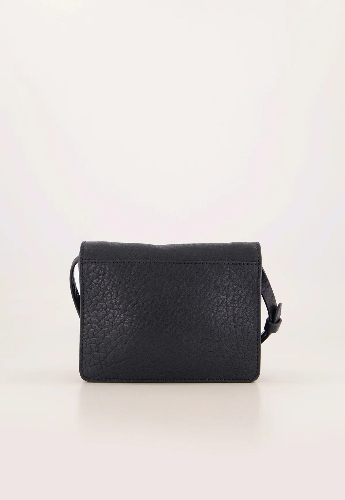 Black textured leather crossbody bag with adjustable strap on a neutral background
