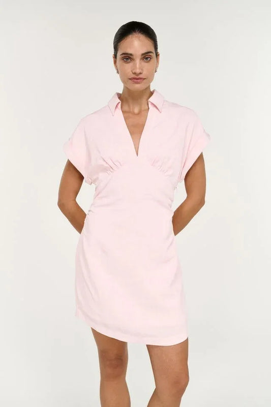 Woman wearing the STAPLE THE LABEL Avella Mini Dress in Rose Pink