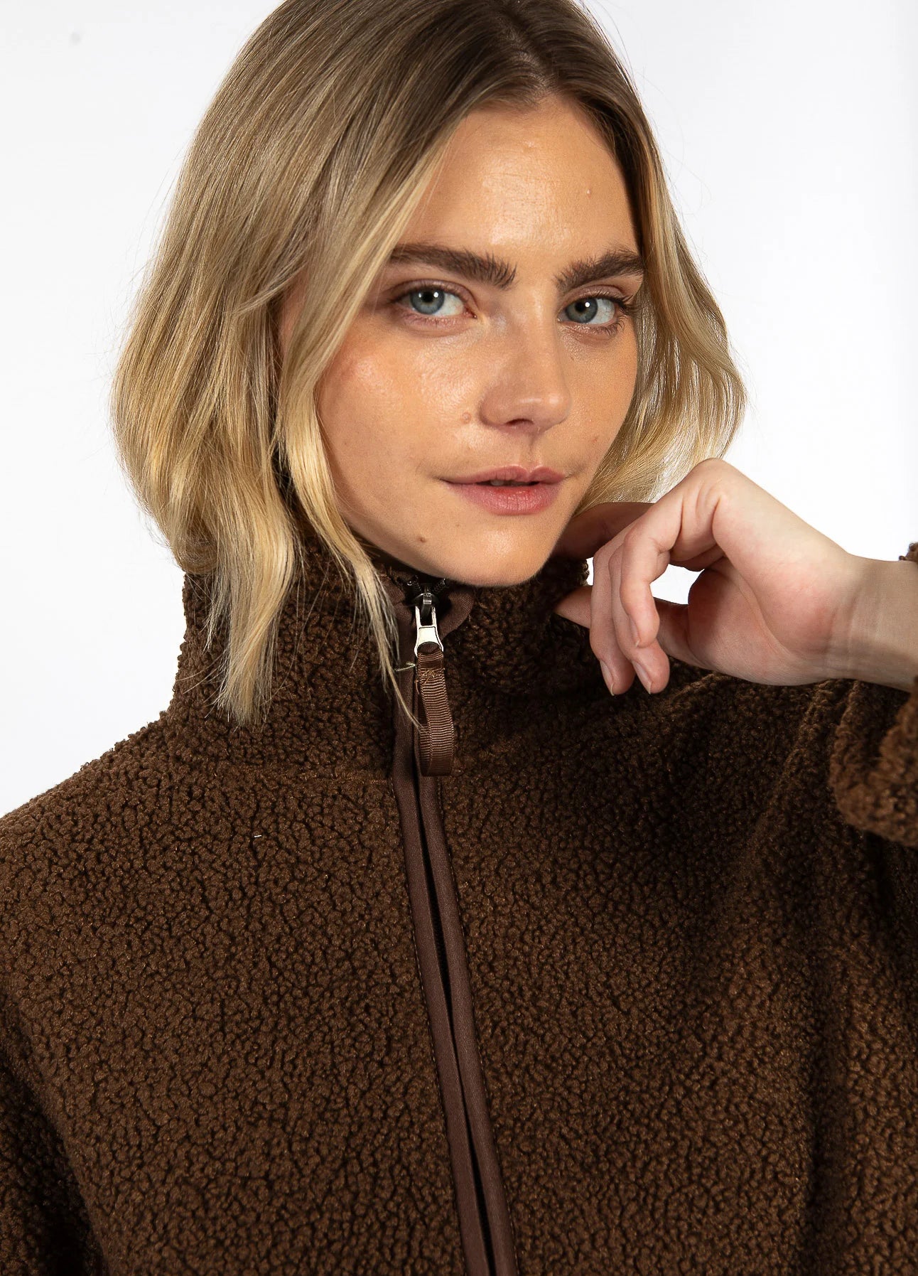 Woman modeling brown sherpa zip-up jacket, The Tartan Fox boutique fashion