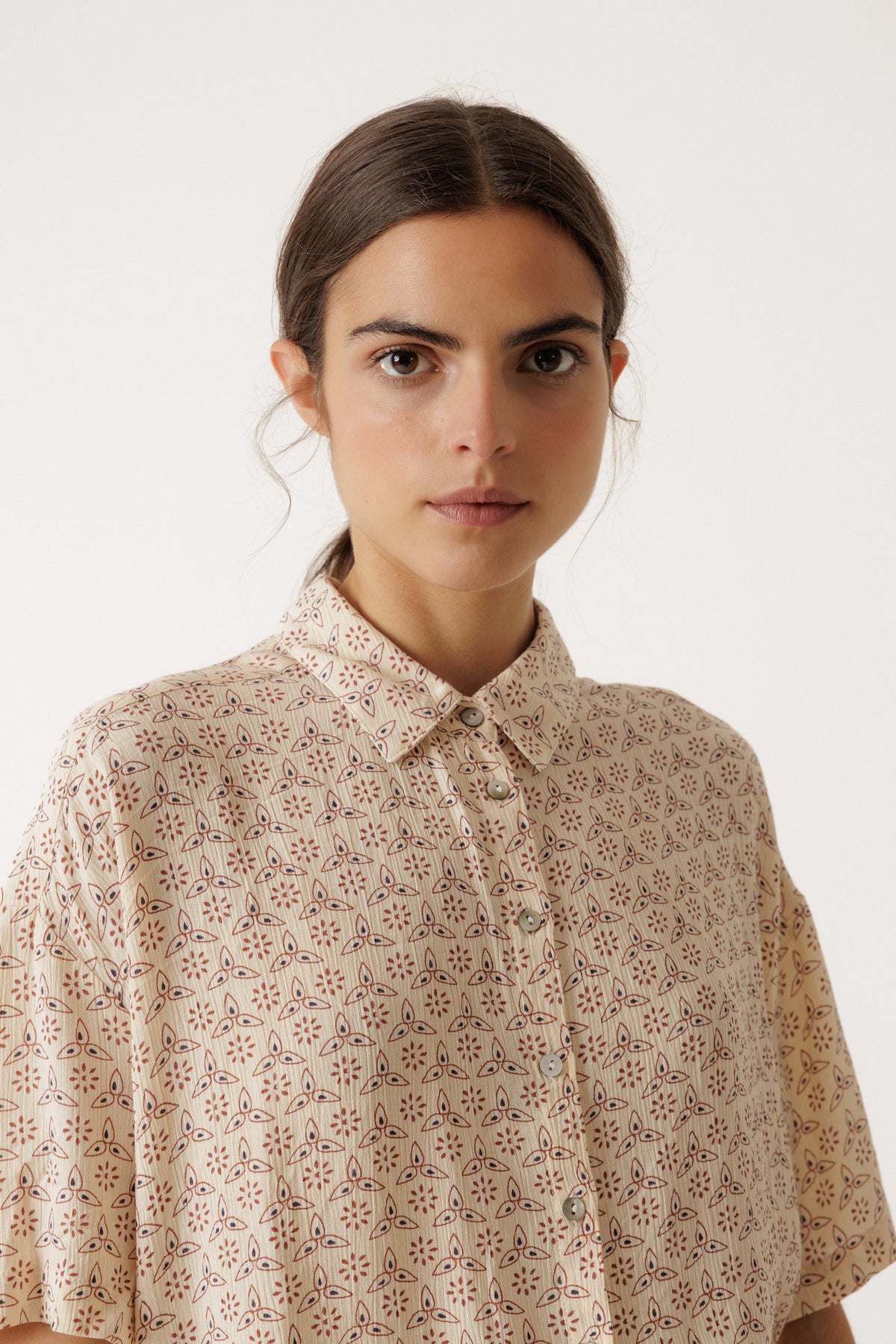 Woman wearing an INDI & COLD Oversized Block Print Shirt in Crudo