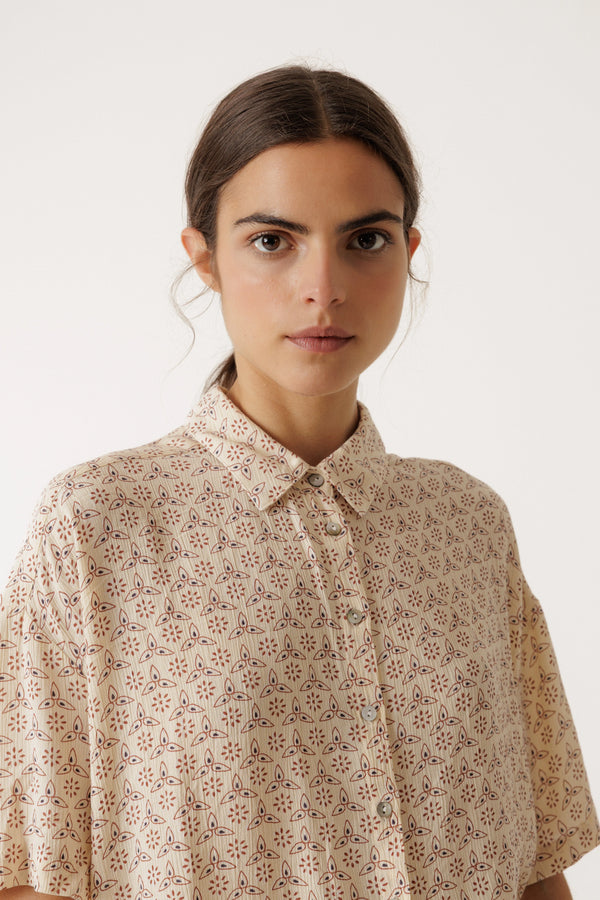 Woman wearing an INDI & COLD Oversized Block Print Shirt in Crudo