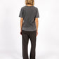 Woman modeling casual dark grey t-shirt and pants, The Tartan Fox fashion boutique