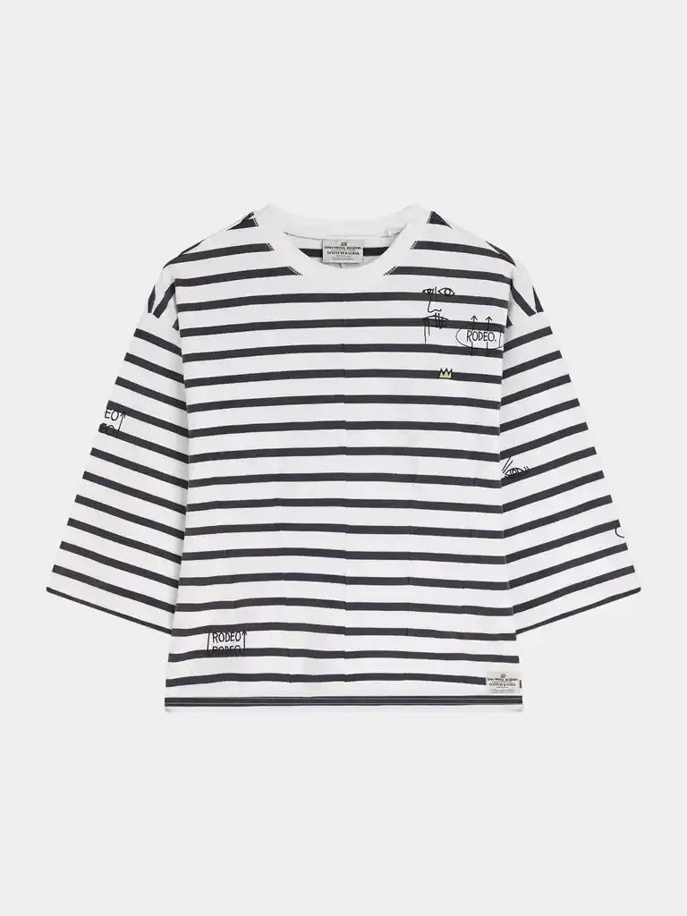 Black and white striped women's fashion top with graphic details