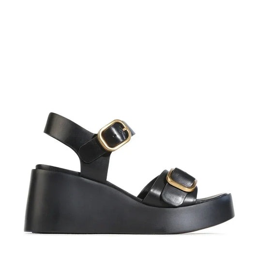 EOS Arias Wedge Sandal in black leather with gold buckles