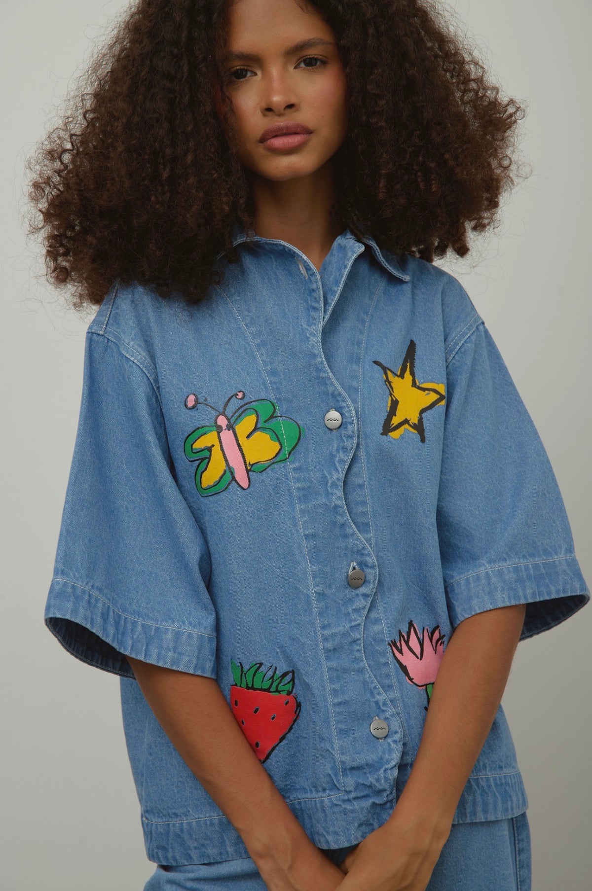 Sixxta Wigglye Short Sleeve Jacket in Denim Sticker