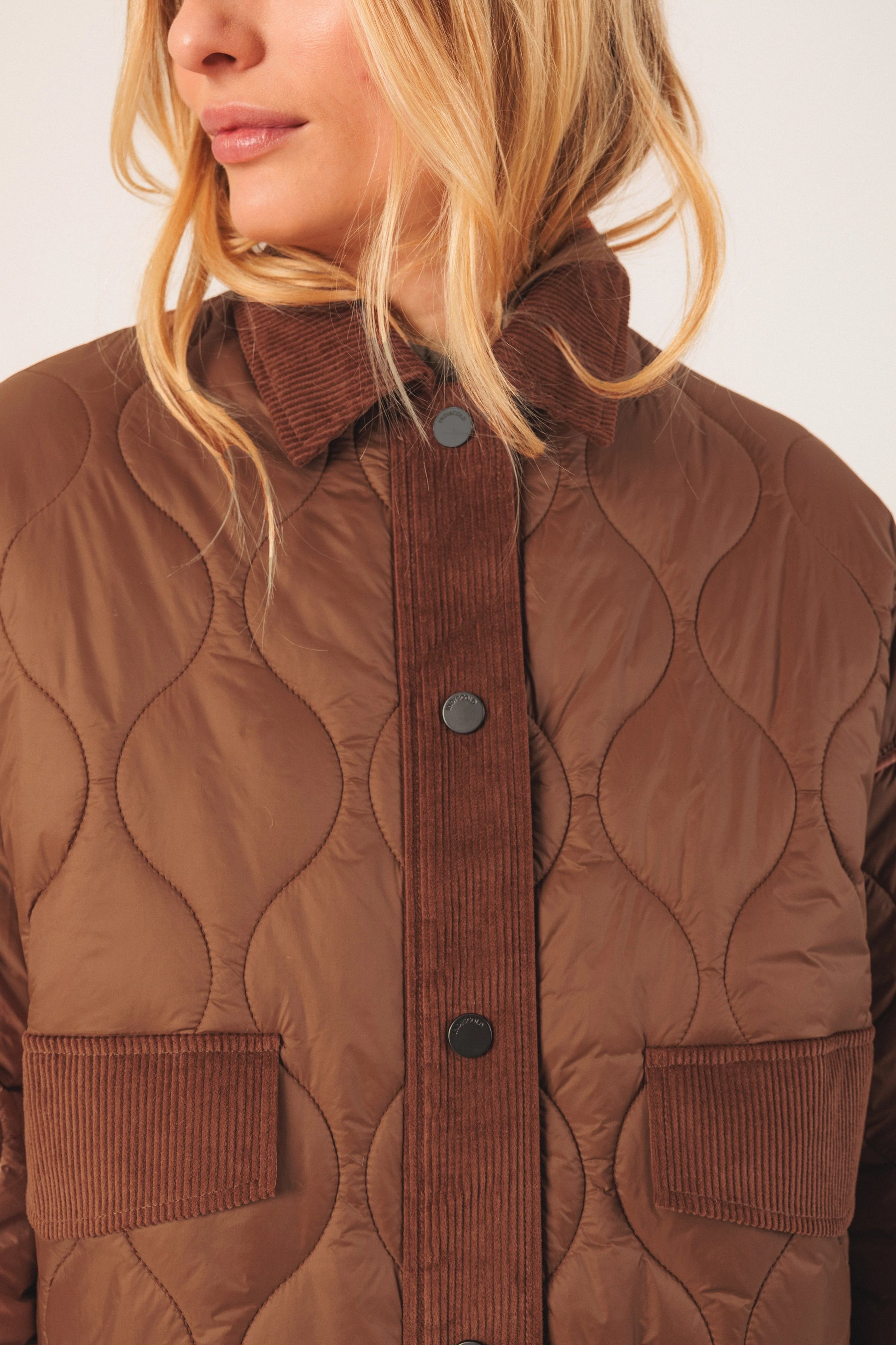 Brown quilted jacket with corduroy collar and button details for women's fashion