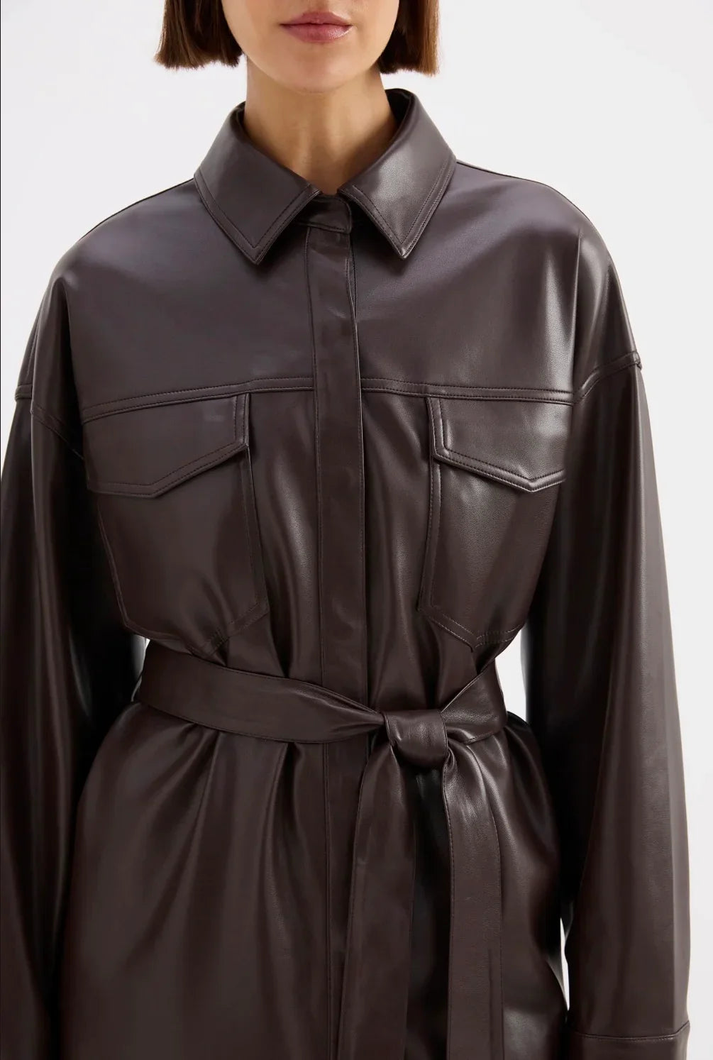Brown leather shirt dress with belt and front pockets