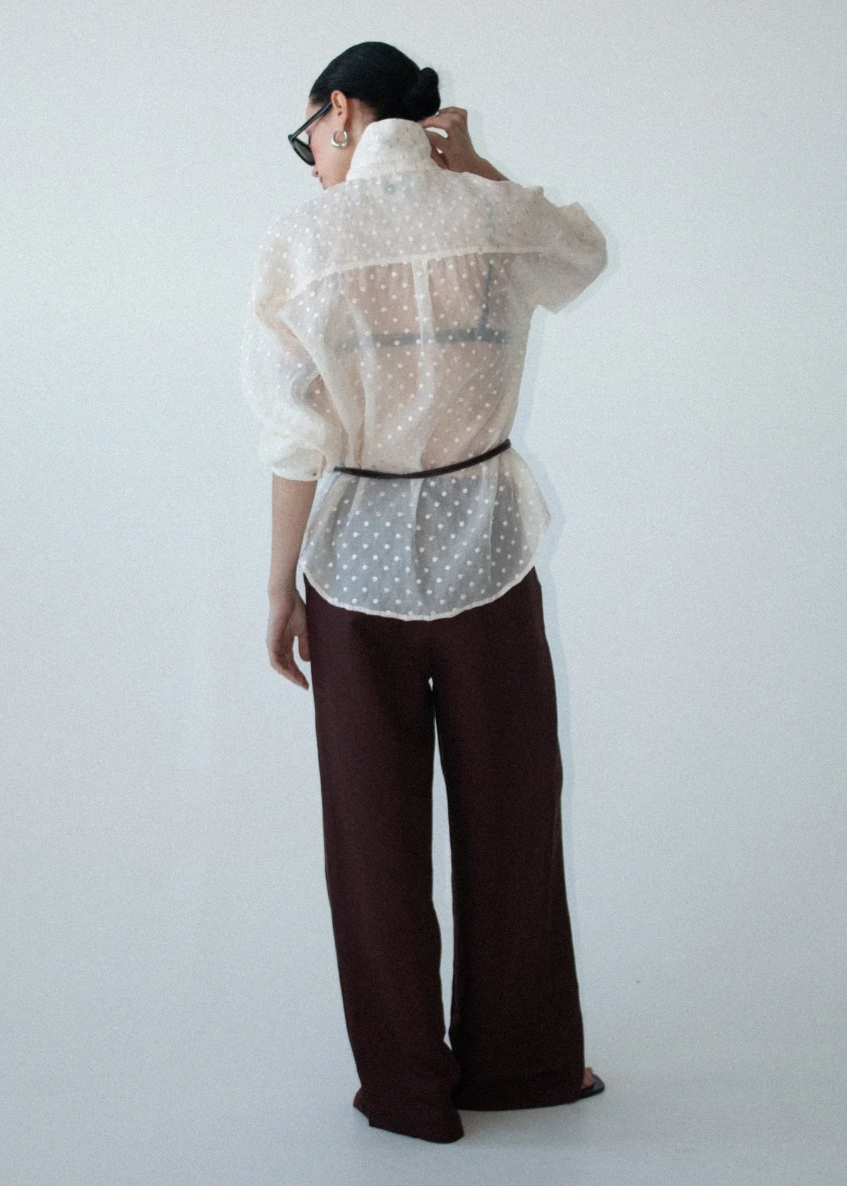 Back view of a model wearing the STAPLE THE LABEL Etoile Oversized Shirt in Cream Spot