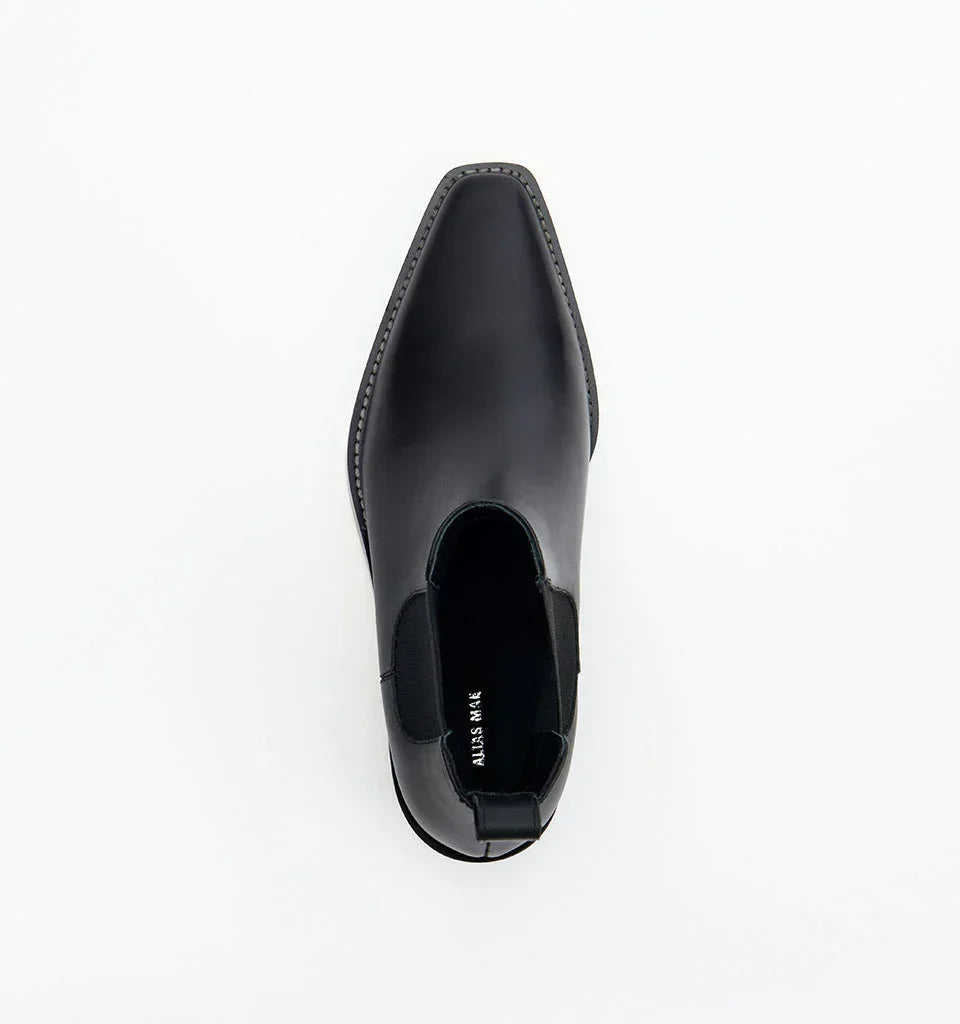 Black leather Chelsea boot with pointed toe and elastic side panels, women's fashion footwear
