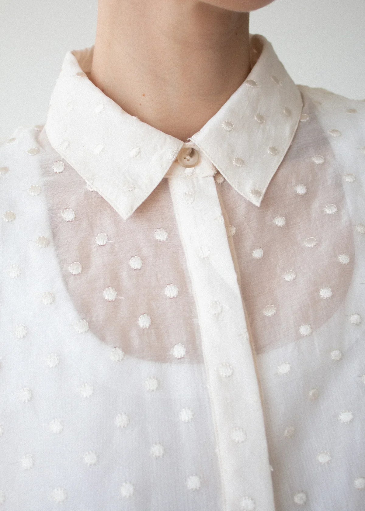 Close-up of the STAPLE THE LABEL Etoile Oversized Shirt in cream spot fabric.