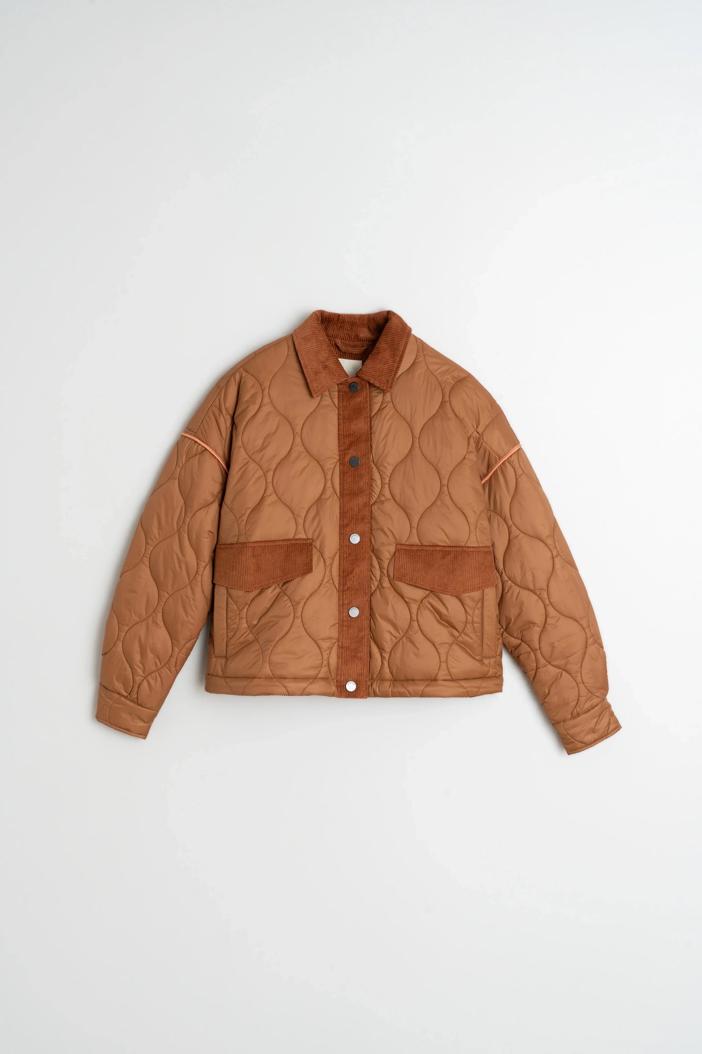 Brown quilted jacket with corduroy collar and pockets, stylish women's outerwear