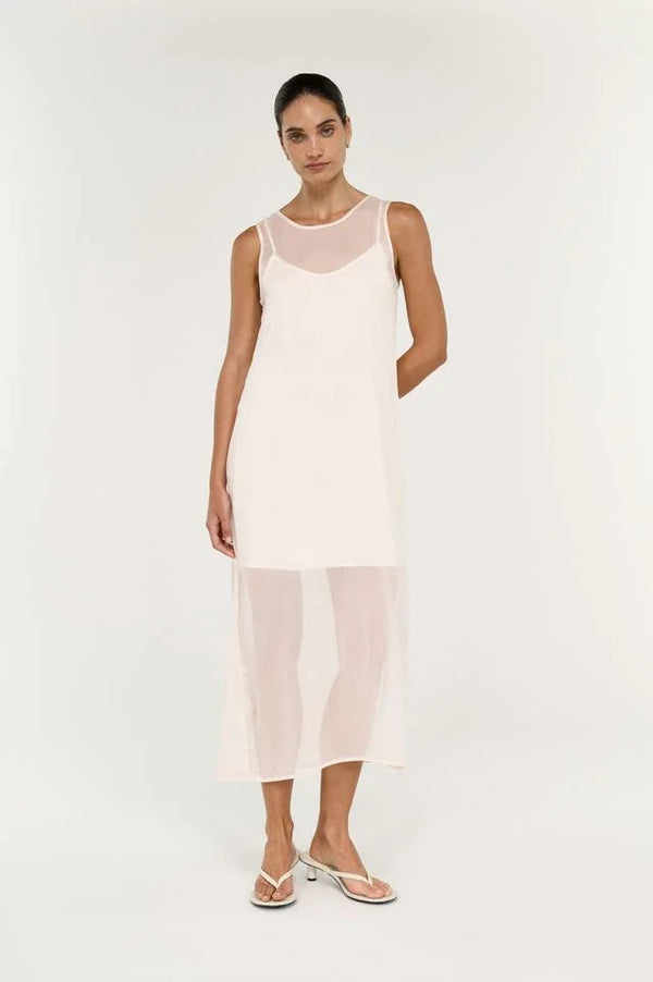 Woman wearing STAPLE THE LABEL Aria Sheer Layered Midi Dress in cream.