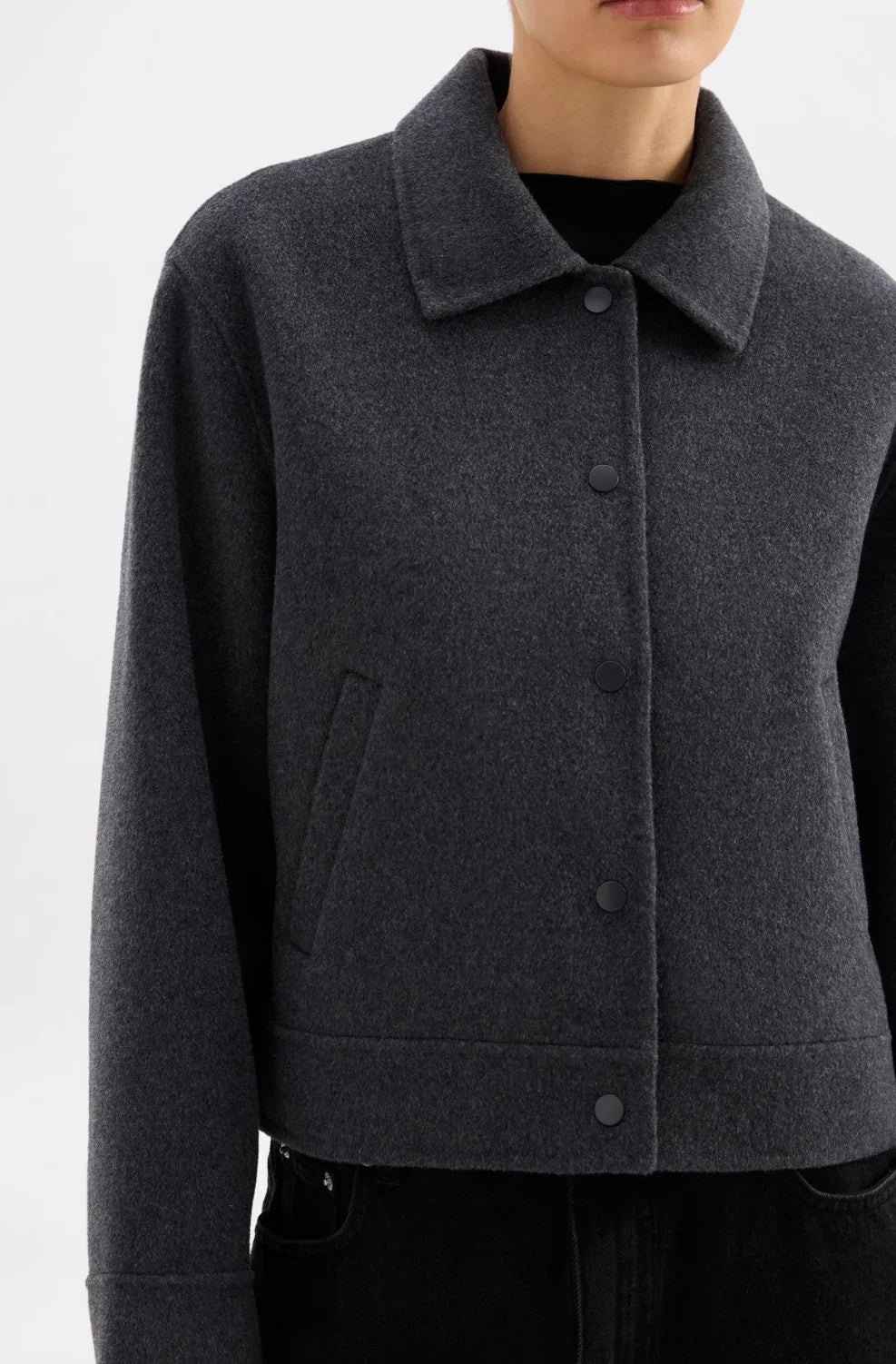 Dark gray wool blend cropped jacket with button front and collar, styled for women's fashion
