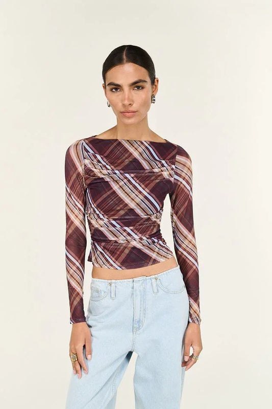 Plaid long sleeve crop top with ruched detail, styled with light wash jeans for women's fashion