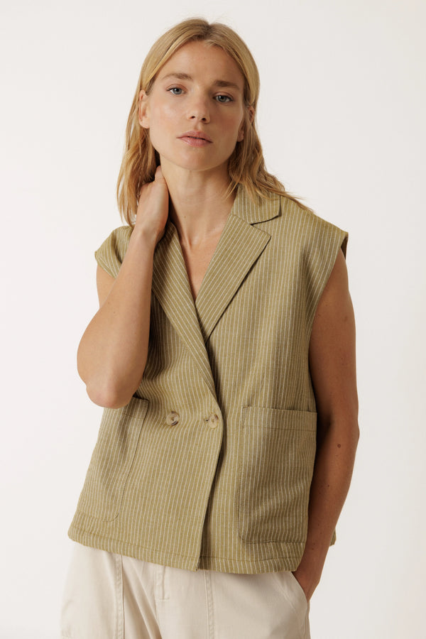 Woman wearing an INDI & COLD Pinstripe Tailored Vest in khaki.