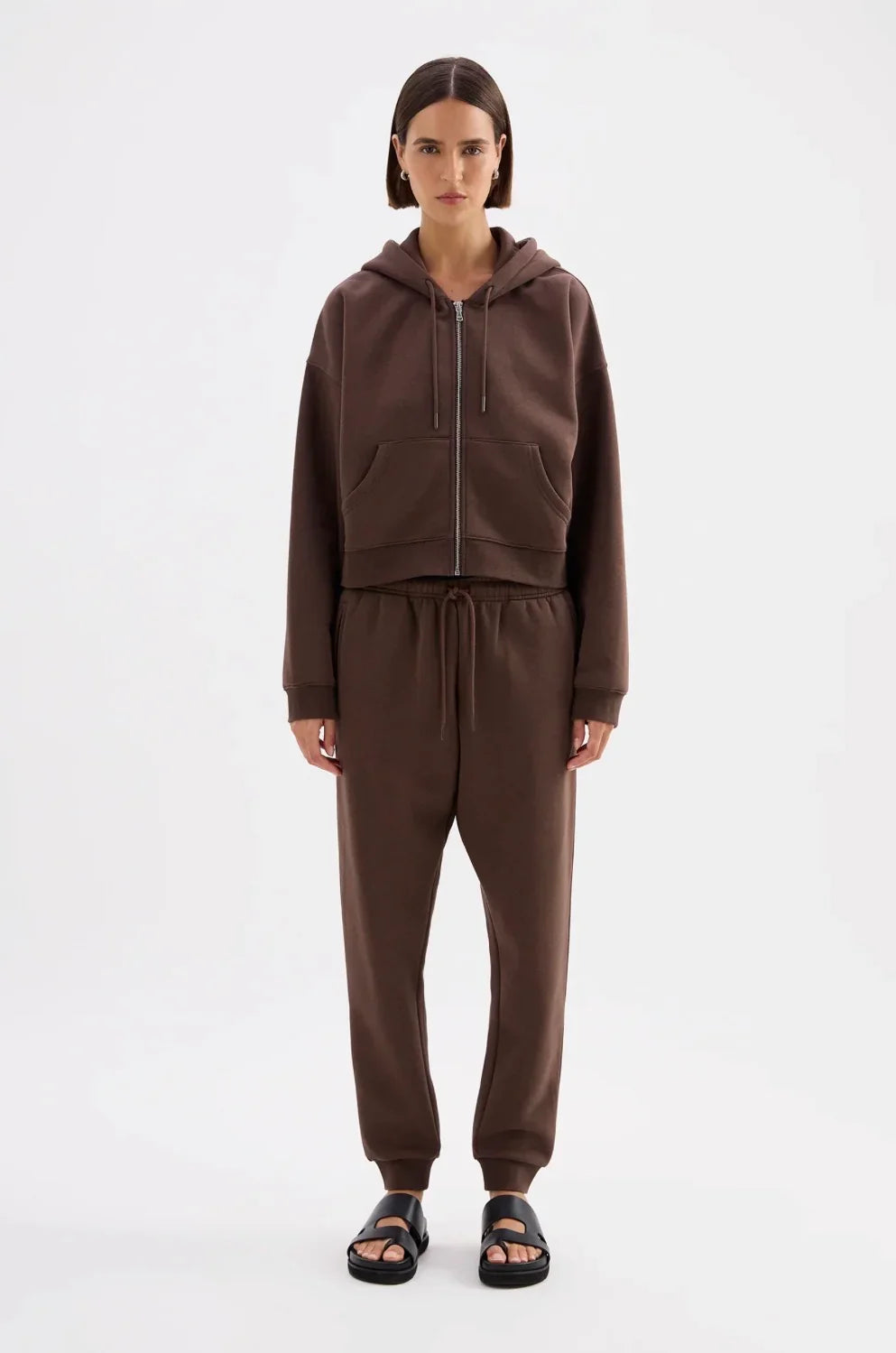Brown zip-up hoodie and jogger set with black sandals, women's fashion