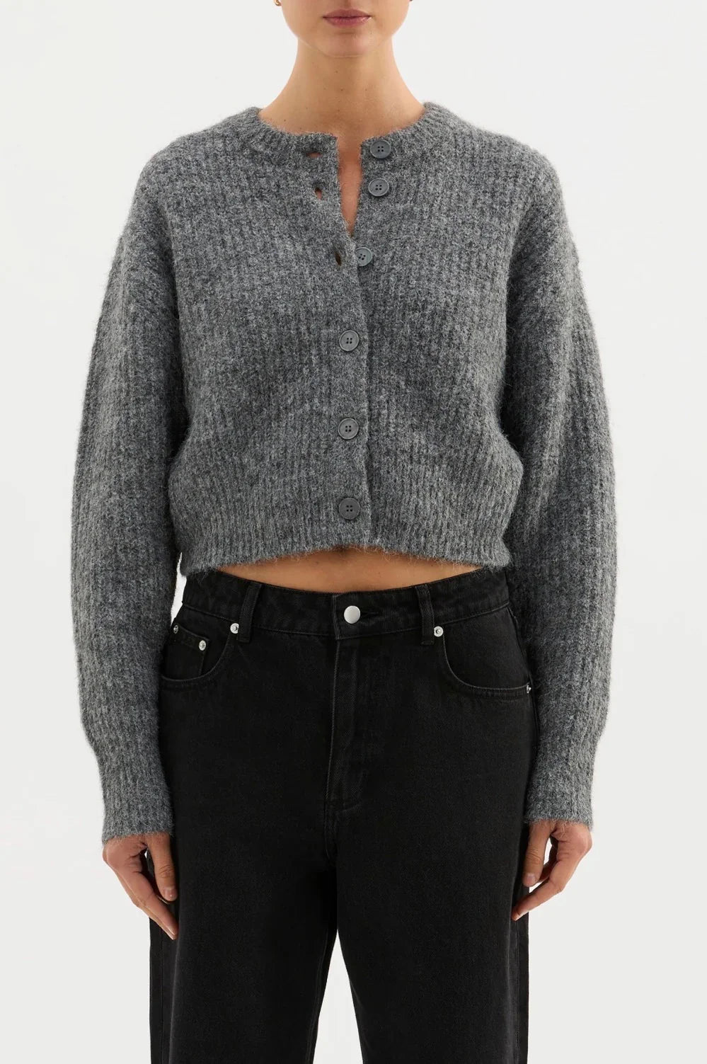 Gray cropped cardigan with buttons paired with black high-waist jeans for women's fashion
