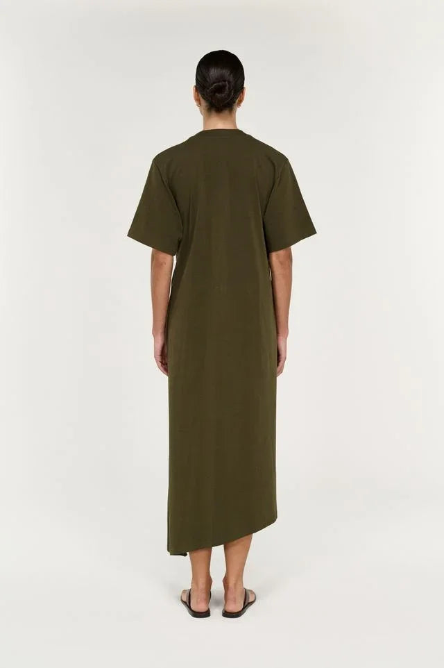 Back view of a woman wearing the STAPLE THE LABEL Tovae Draped Midi Tee Dress in olive green