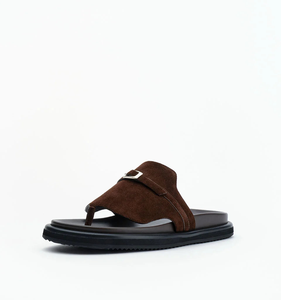 Brown suede buckled slide sandals with a thick platform sole