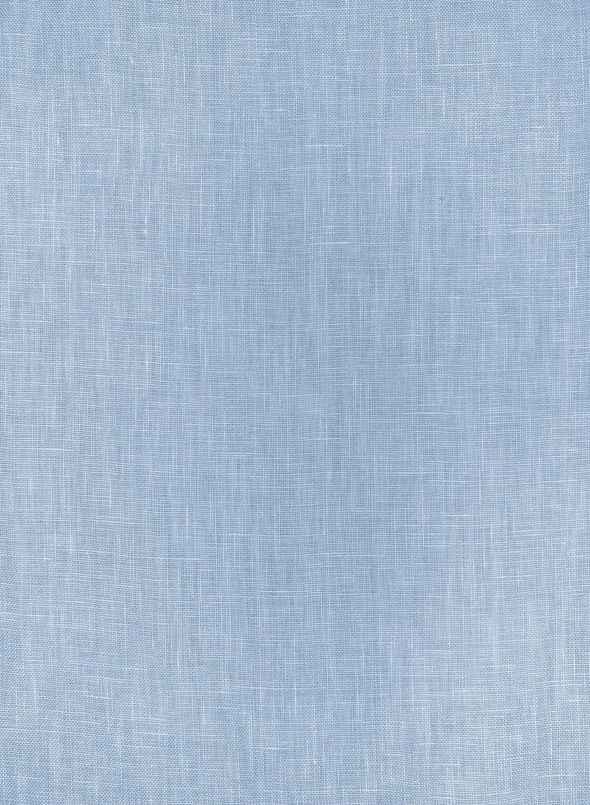Close-up texture of ice blue fabric from the Esmaee Olivia Pant.