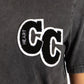 Close-up of a grey women's t-shirt with black and white 'CC HEART' patch, The Tartan Fox fashion