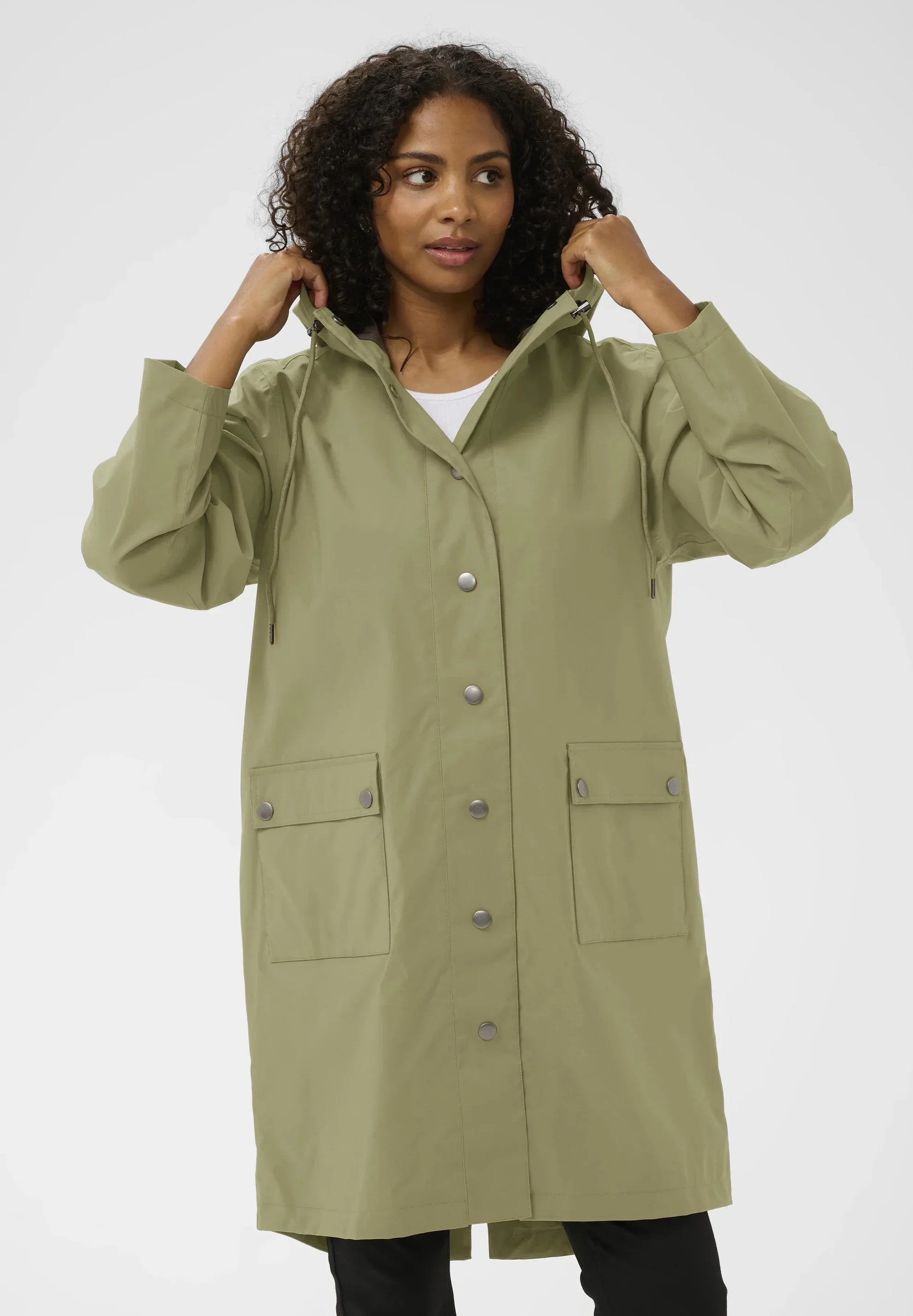 Olive green women's raincoat with hood and front pockets, stylish and functional outerwear