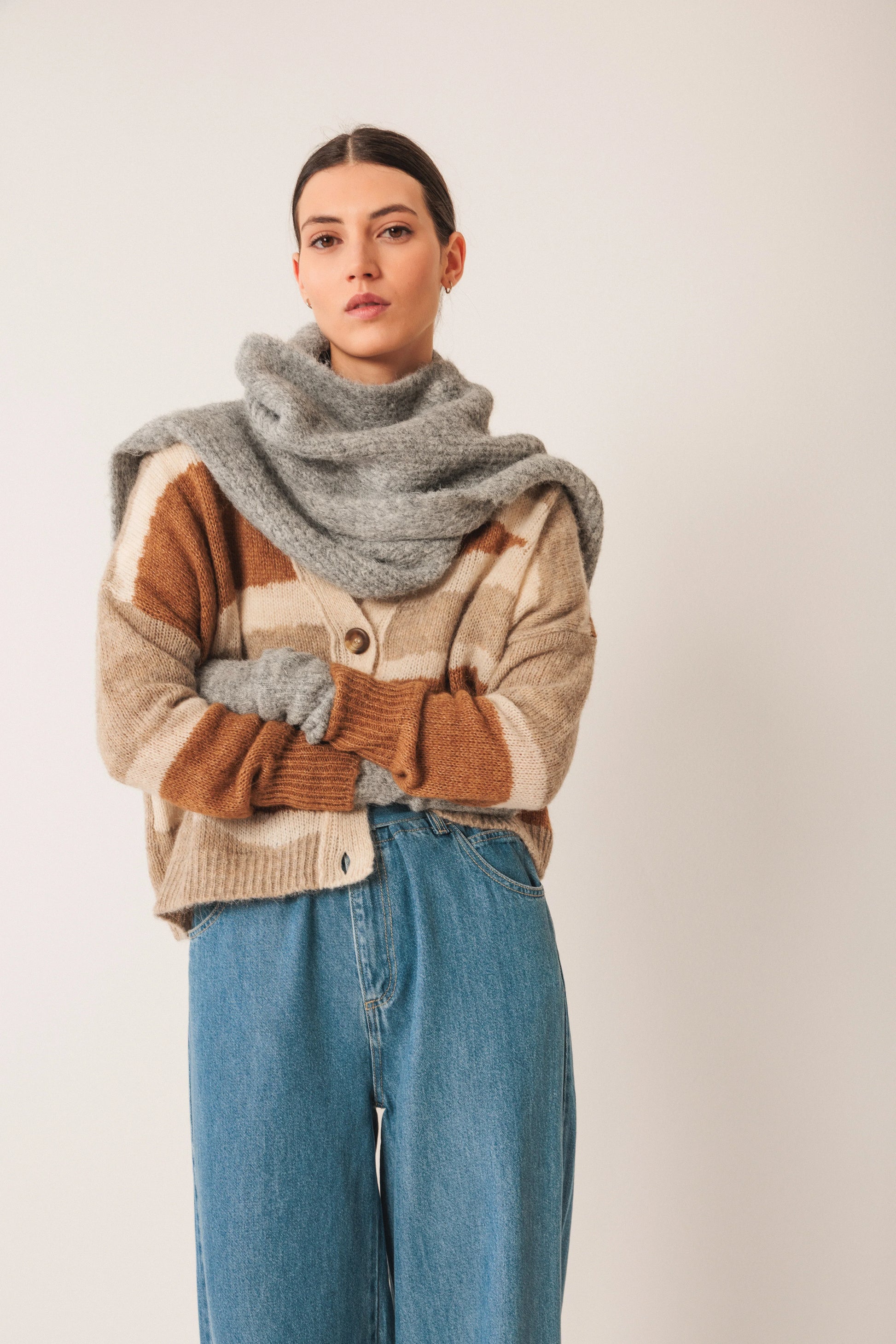 Cozy striped cardigan with gray scarf and wide-leg jeans for women's fashion