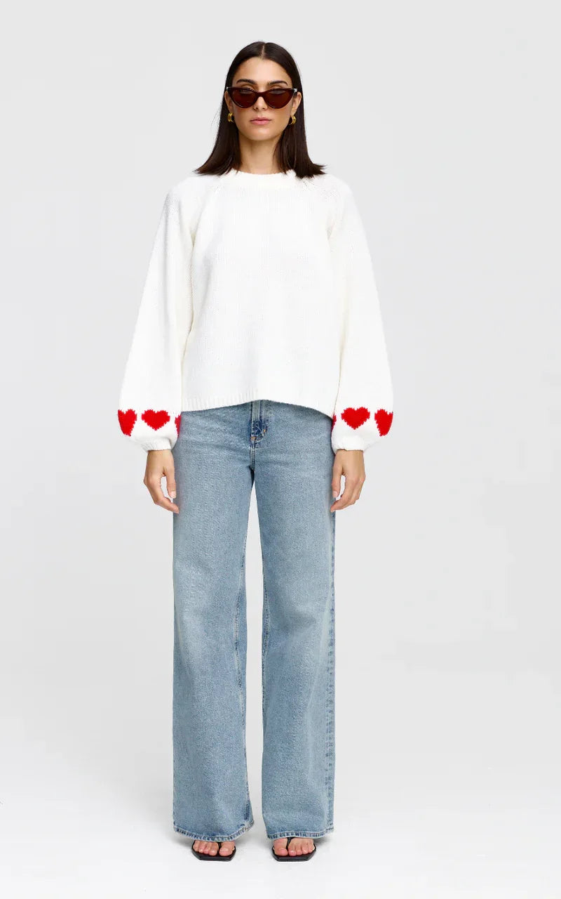 White heart-detail sweater with wide-leg jeans, women's fashion