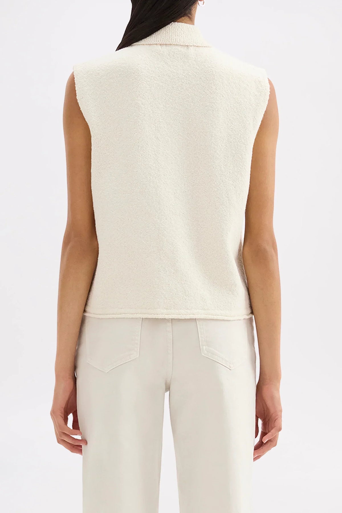 Back view of the Nude Lucy Riella Knit Vest in Dune paired with matching trousers