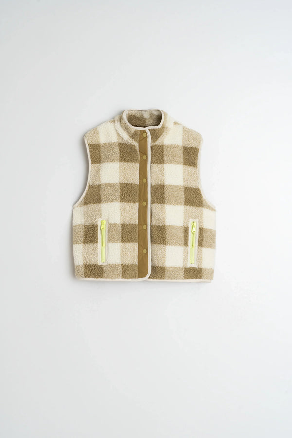 Plaid shearling vest with neon zippers and button front, cozy winter fashion