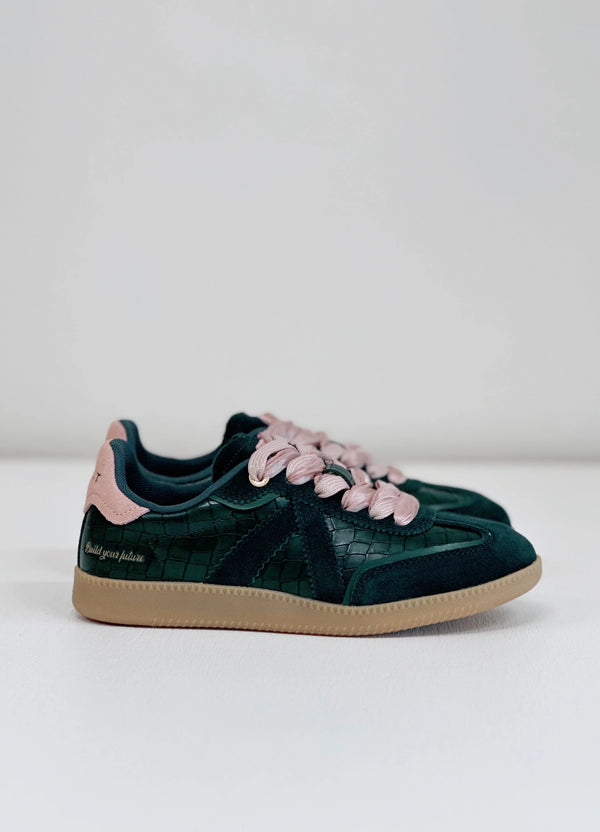 Green croc-texture sneaker with pink laces and suede accents, stylish everyday footwear