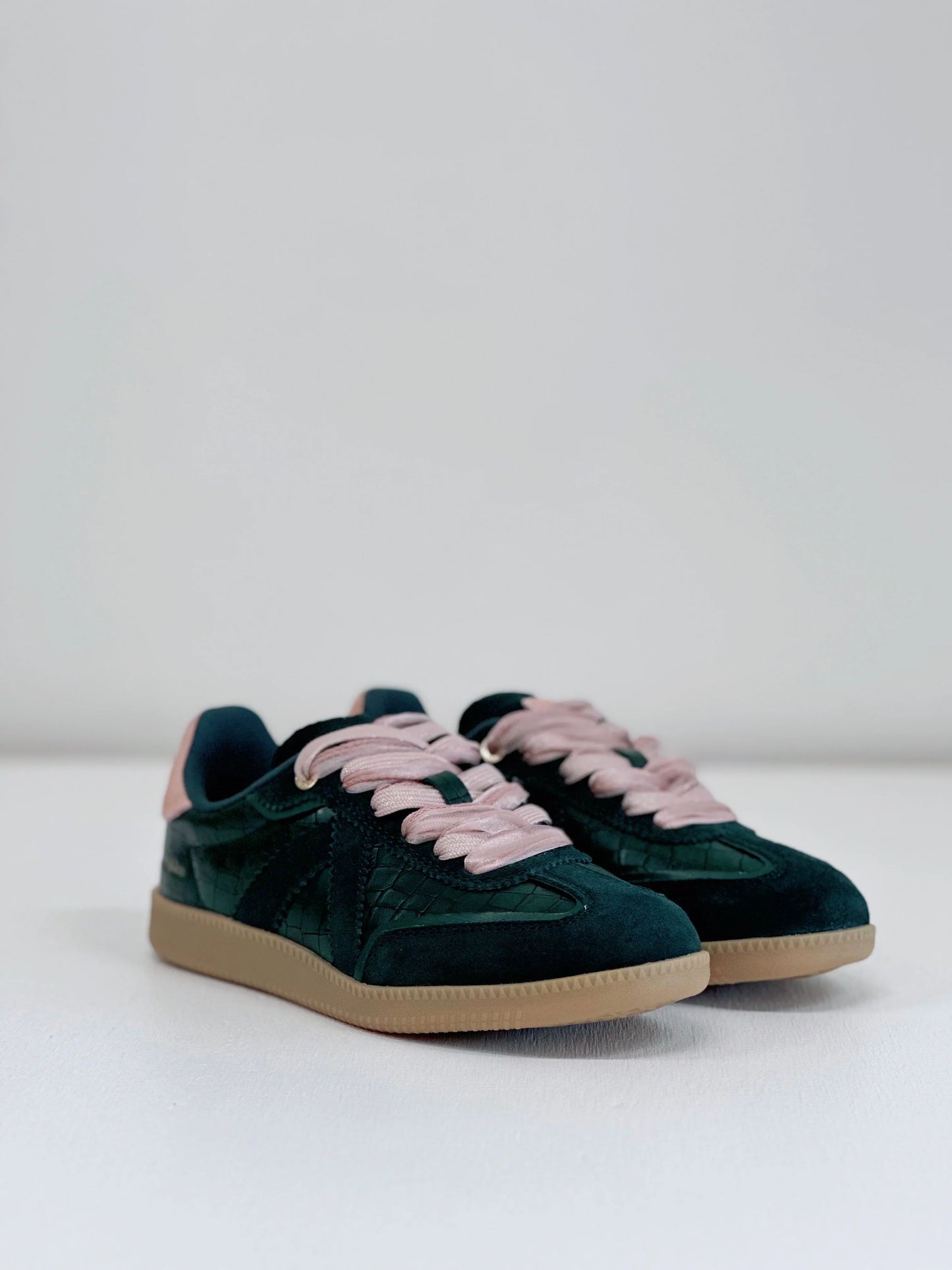 Dark green suede sneakers with pink laces and gum sole, stylish everyday footwear