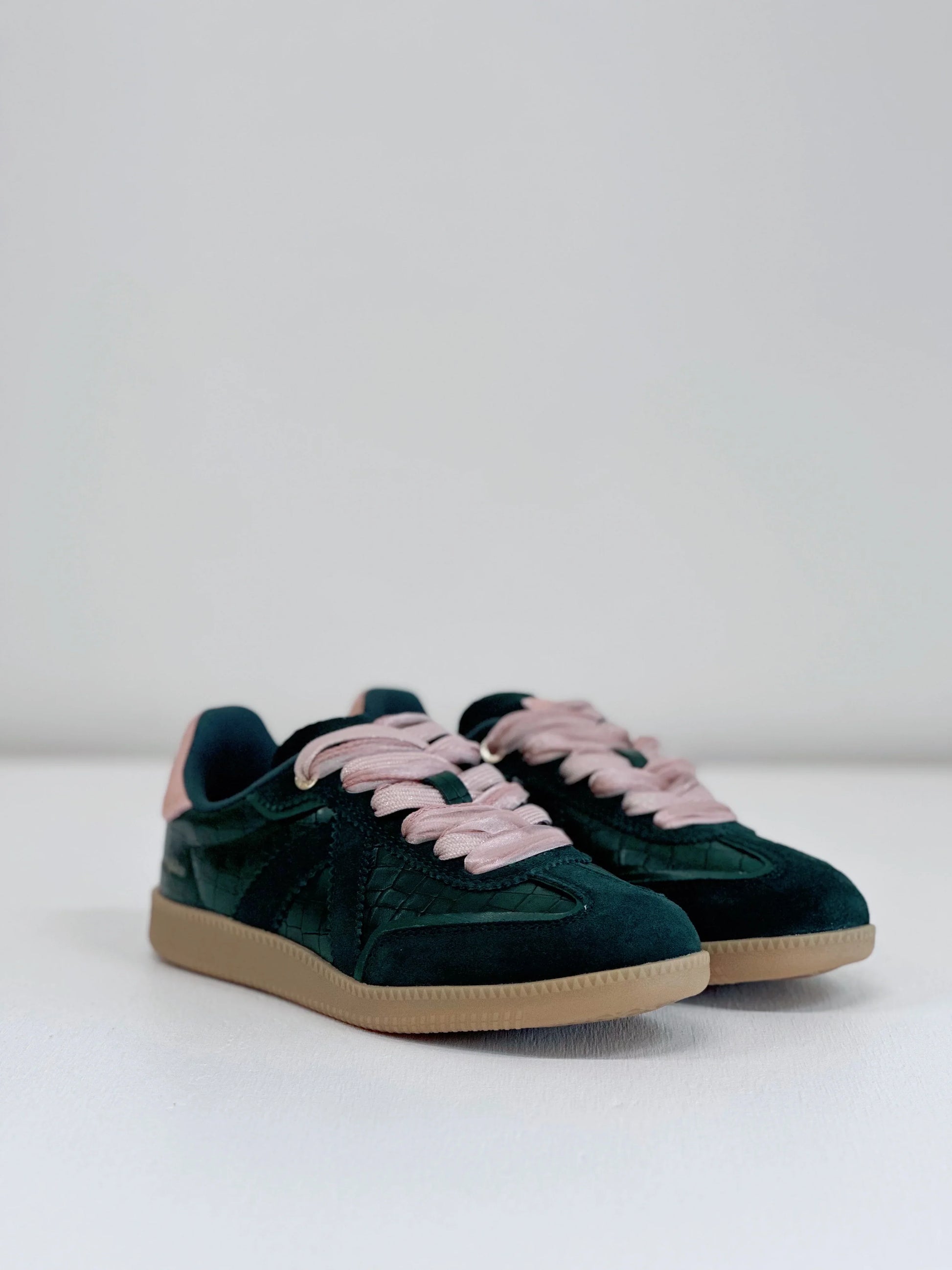 Dark green suede sneakers with pink laces and gum sole, stylish everyday footwear