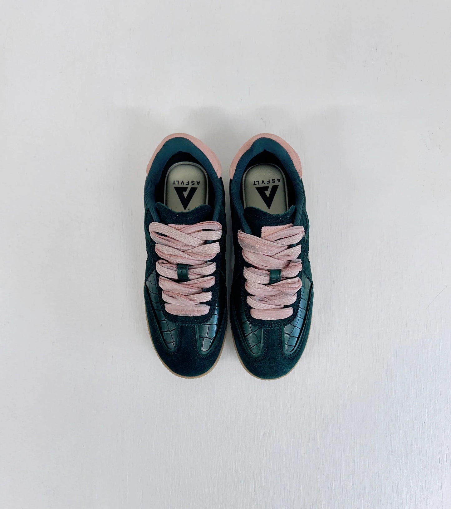Dark green suede sneakers with pink laces and croc-textured toe, ASFLVLT branding visible