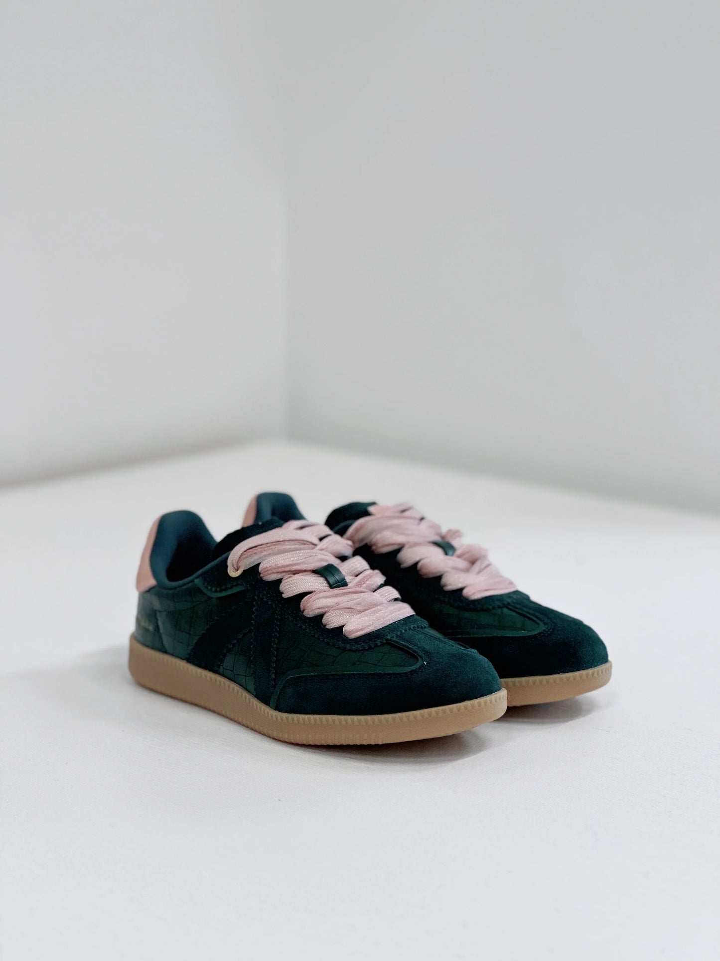 Dark green suede sneakers with pink laces and gum sole, stylish everyday footwear