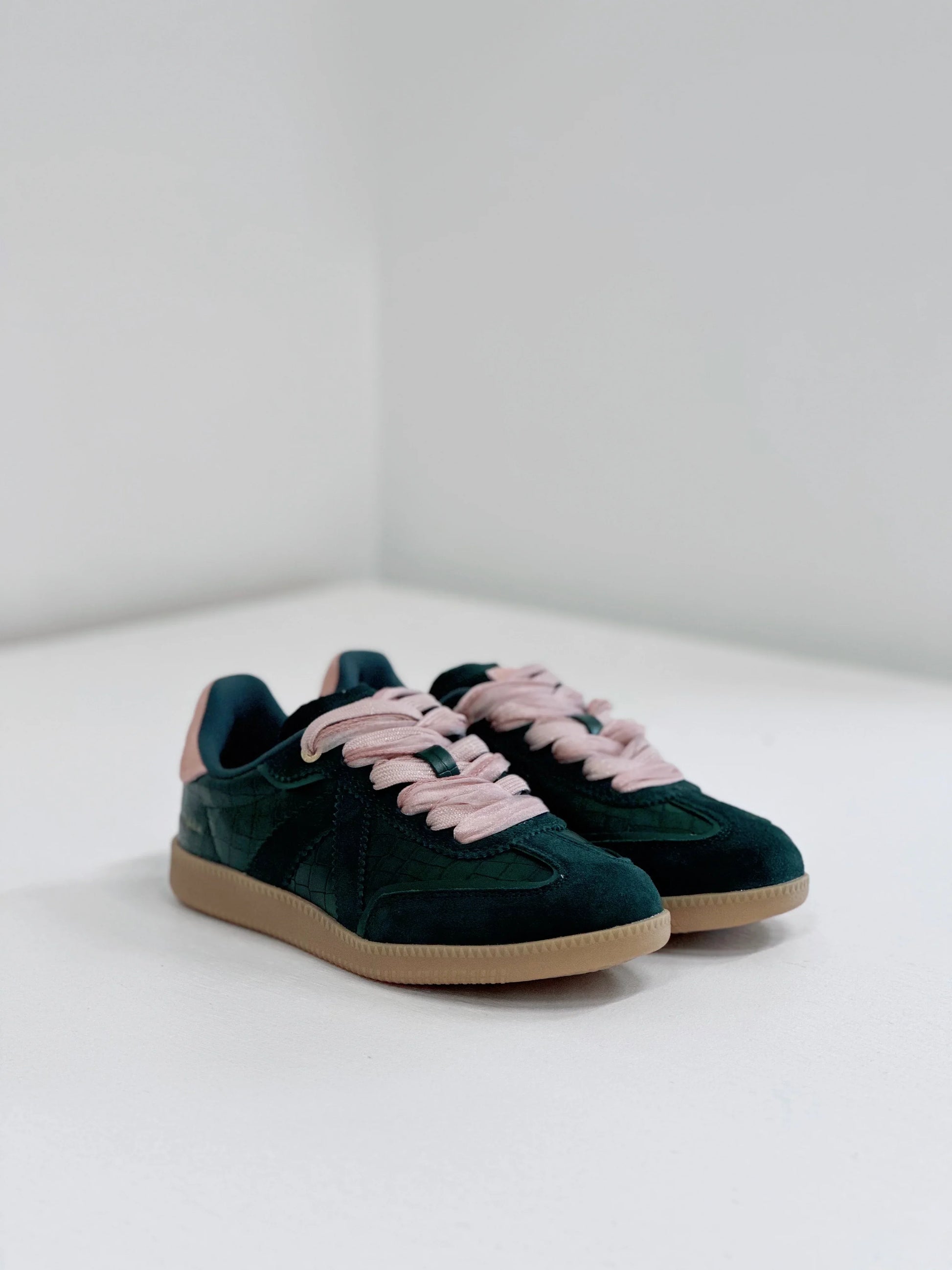 Dark green suede sneakers with pink laces and gum sole, stylish everyday footwear