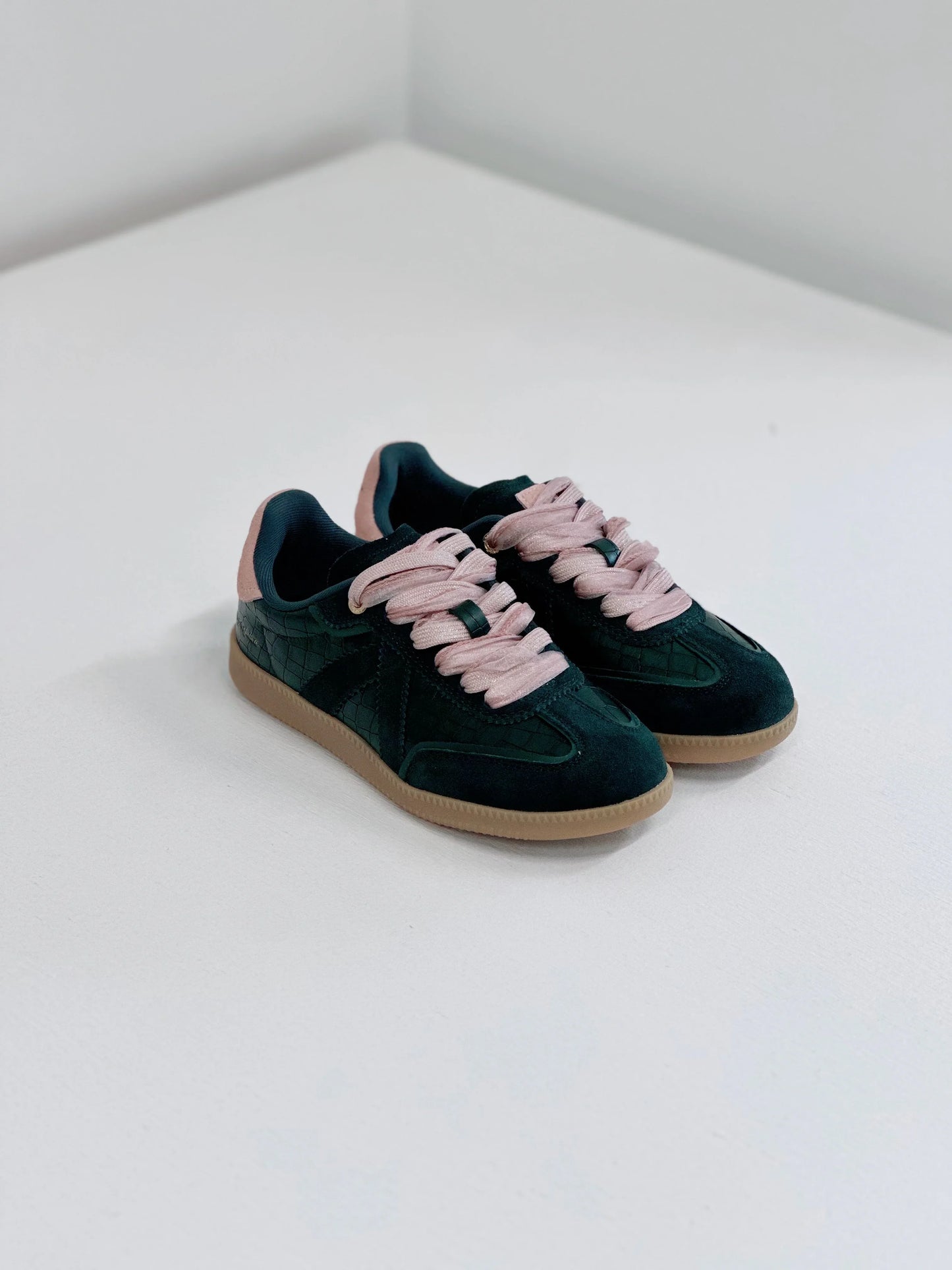 Dark green suede sneakers with pink laces and gum sole, stylish everyday footwear