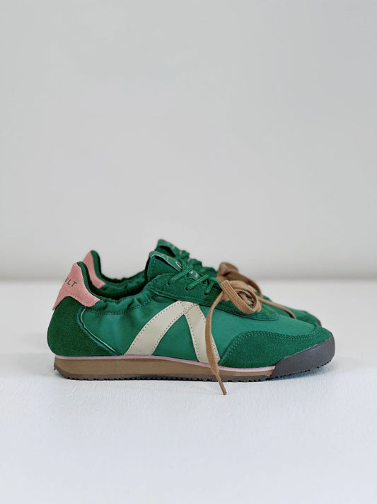 Green suede sneakers with pink heel tab and beige stripe, casual everyday footwear