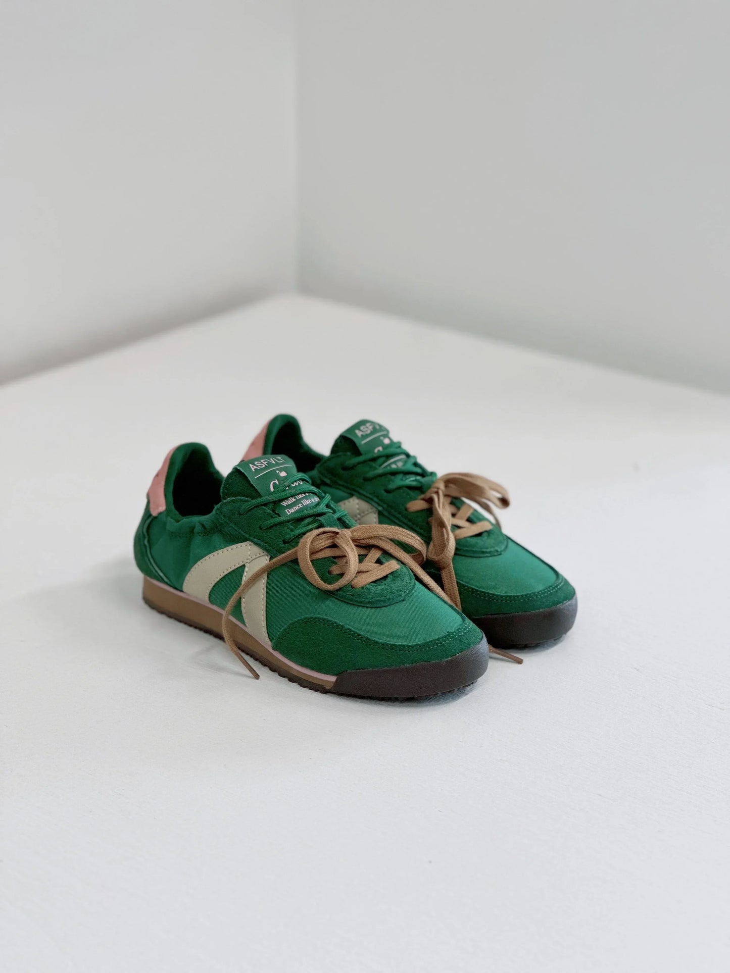 Green ASFLT sneakers with beige accents and brown laces, stylish everyday footwear
