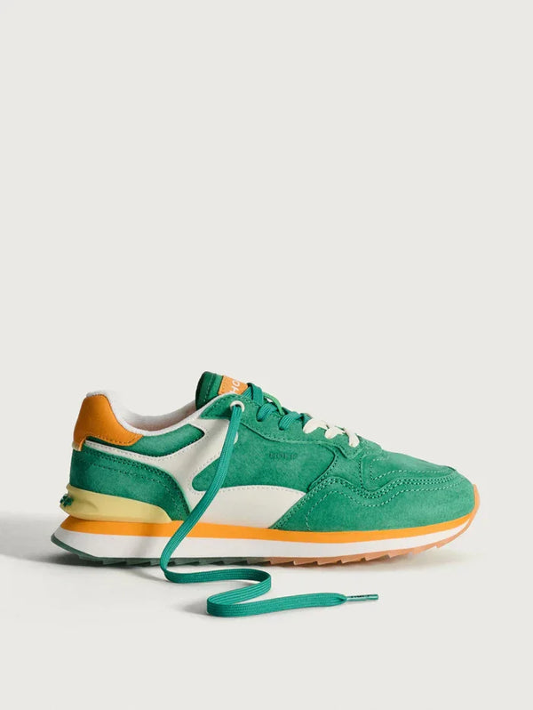 Green and orange retro sneaker with white accents and teal laces