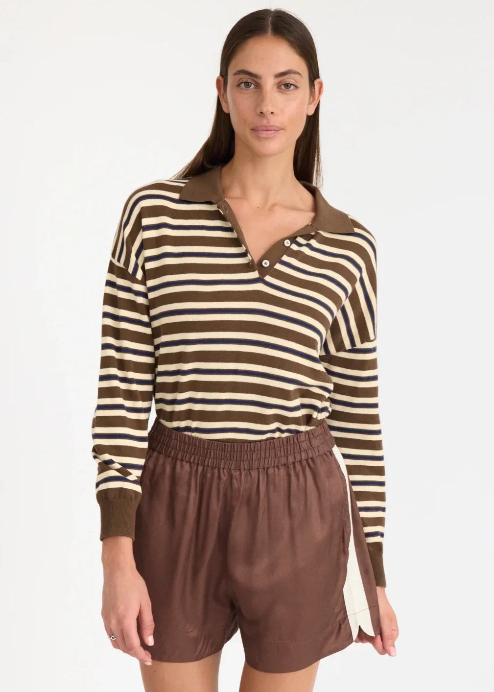 Woman wearing striped long sleeve polo top and brown shorts, women's fashion