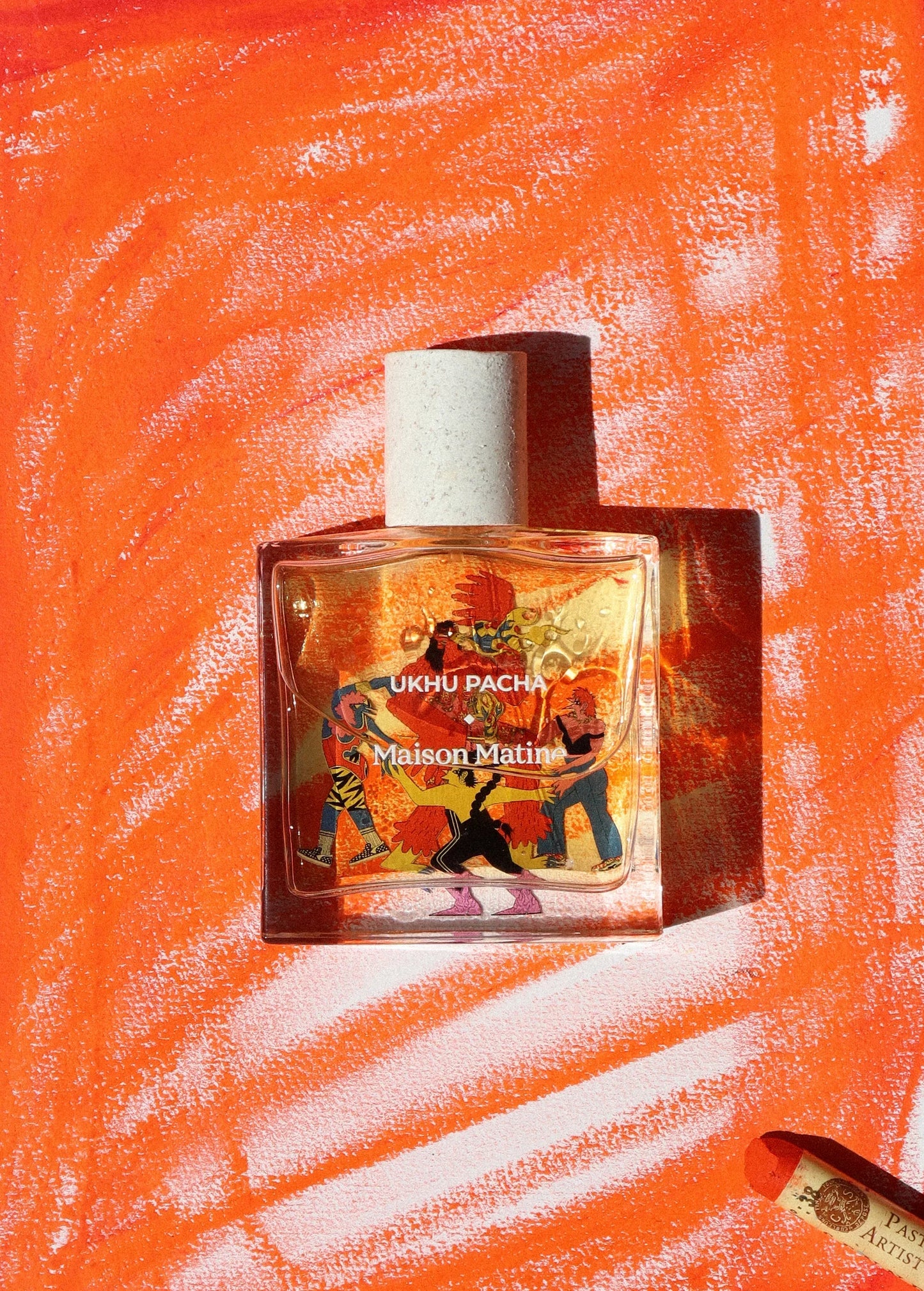 Ukhu Pacha Maison Matine perfume bottle with vibrant artwork on orange textured background