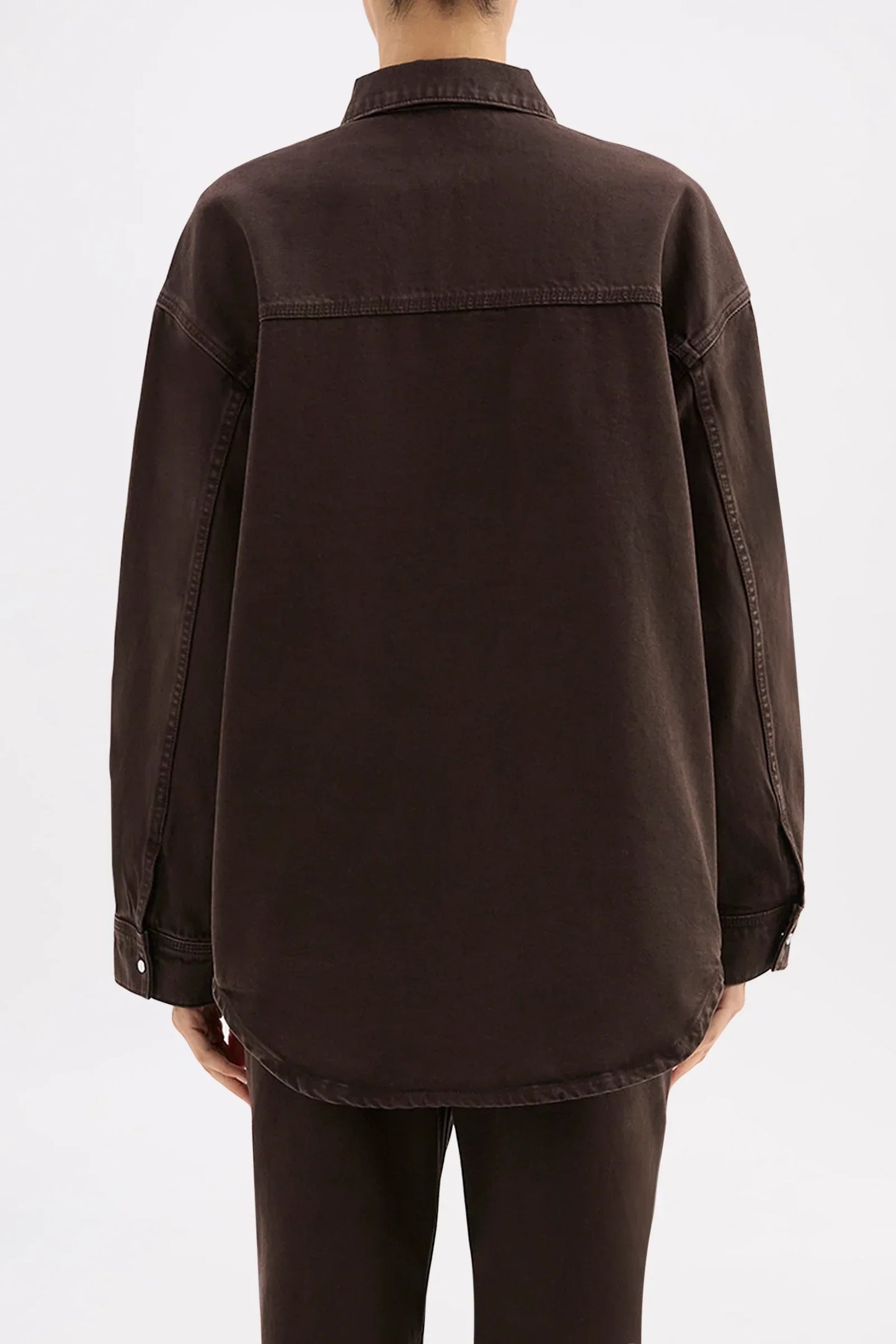 Dark oversized denim shirt with relaxed fit, back view for women's fashion