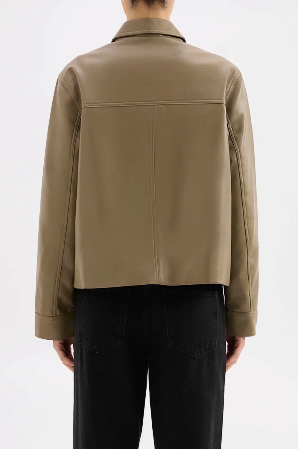 Olive green faux leather jacket with collar, back view, paired with black jeans for women's fashion