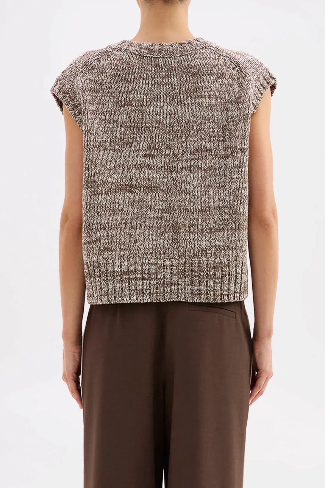 Women's marled knit sleeveless top with ribbed hem, paired with brown wide-leg pants
